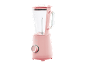 Roze blender sa staklenom posudom sa merama i kontrolnim dugmetom.