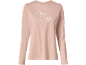 Roze majica dugih rukava sa natpisom „Stay Cozy“.