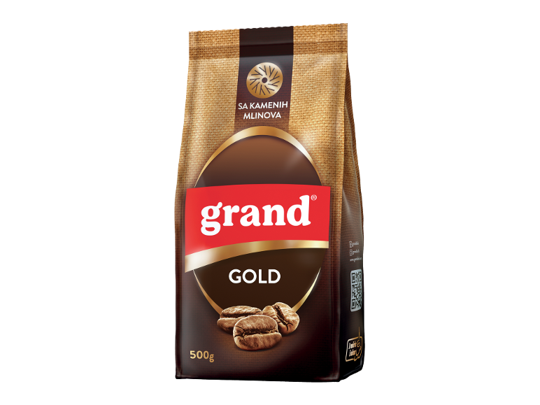 Kesica kafe u zrnu u braon i zlatnim tonovima, sa natpisom „Grand Gold“.