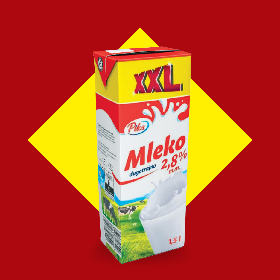 Karton Pilos mleka od 1,5 litara sa 2,8% mlečne masti, na crveno-žutoj pozadini.