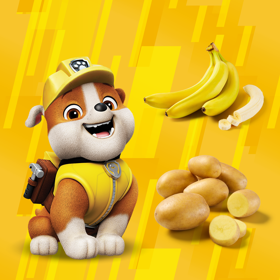 Crtani kučić sa bananama i krompirom na žutoj pozadini.