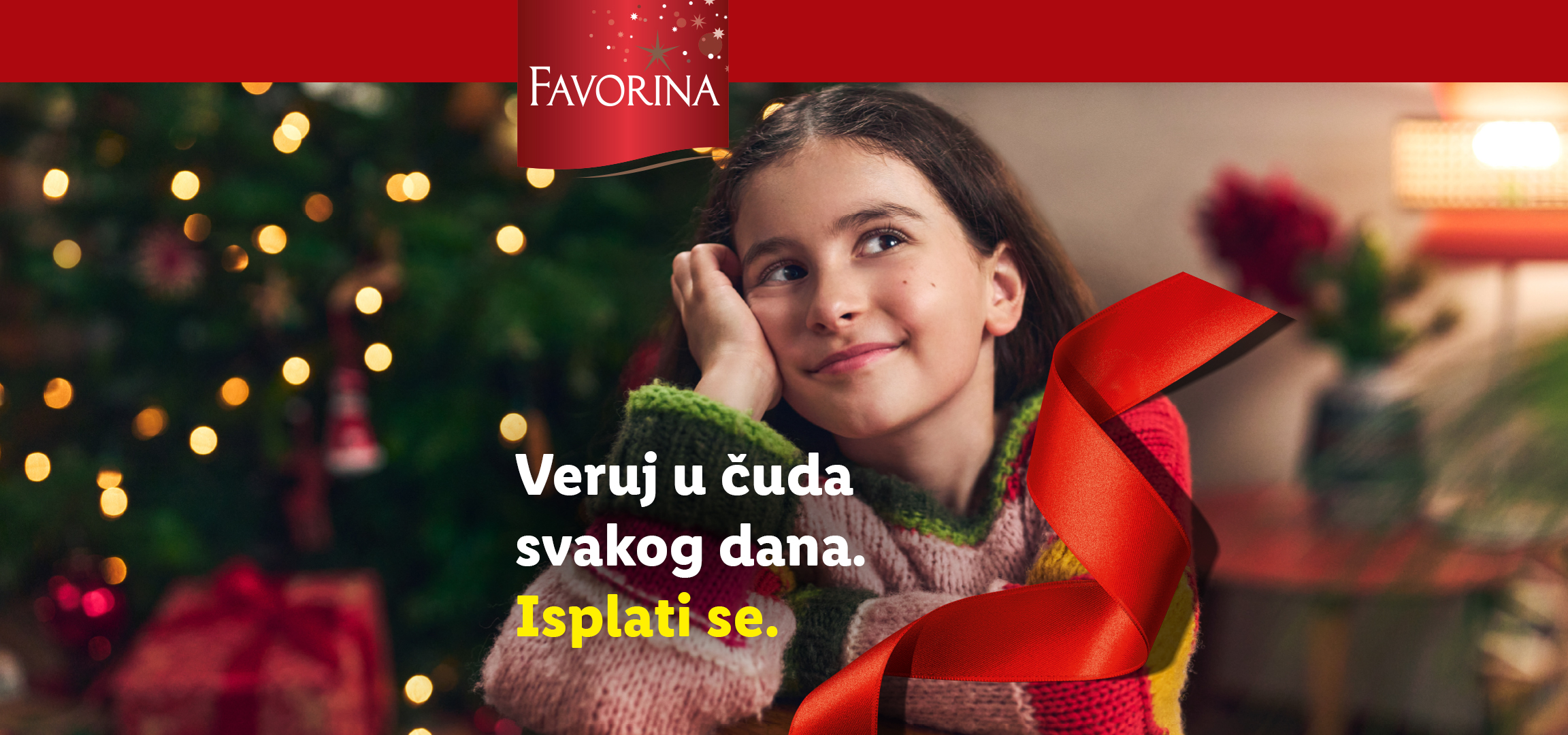 Devojčica u šarenom džemperu sa Favorina logom i tekstom: Veruj u čuda svakog dana. Isplati se.