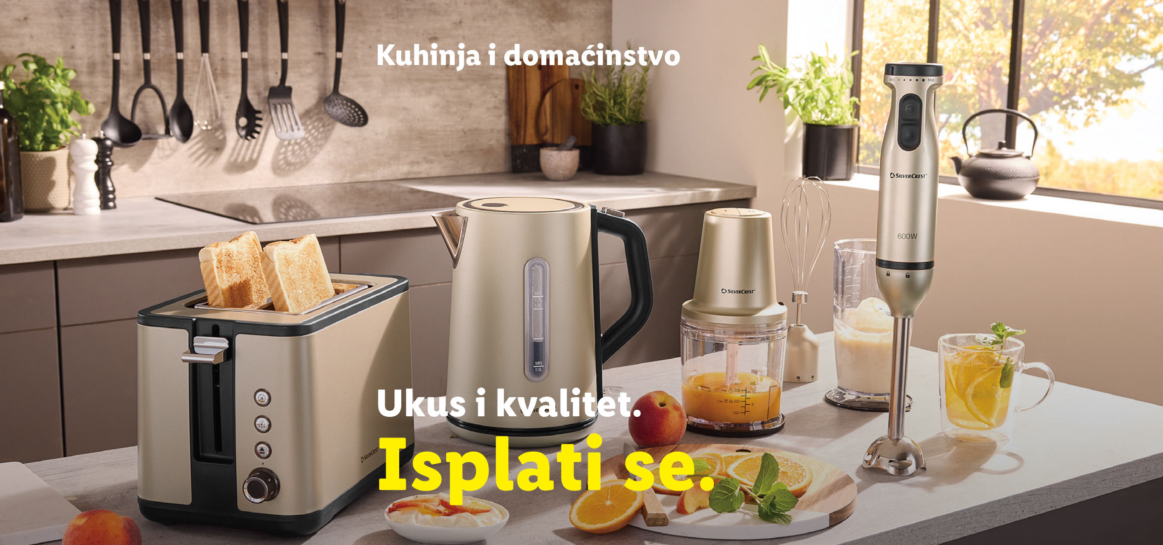 Kuhinjski aparati SilverCrest: toster, kuvalo, blender, seckalica, sa voćem i pićem.