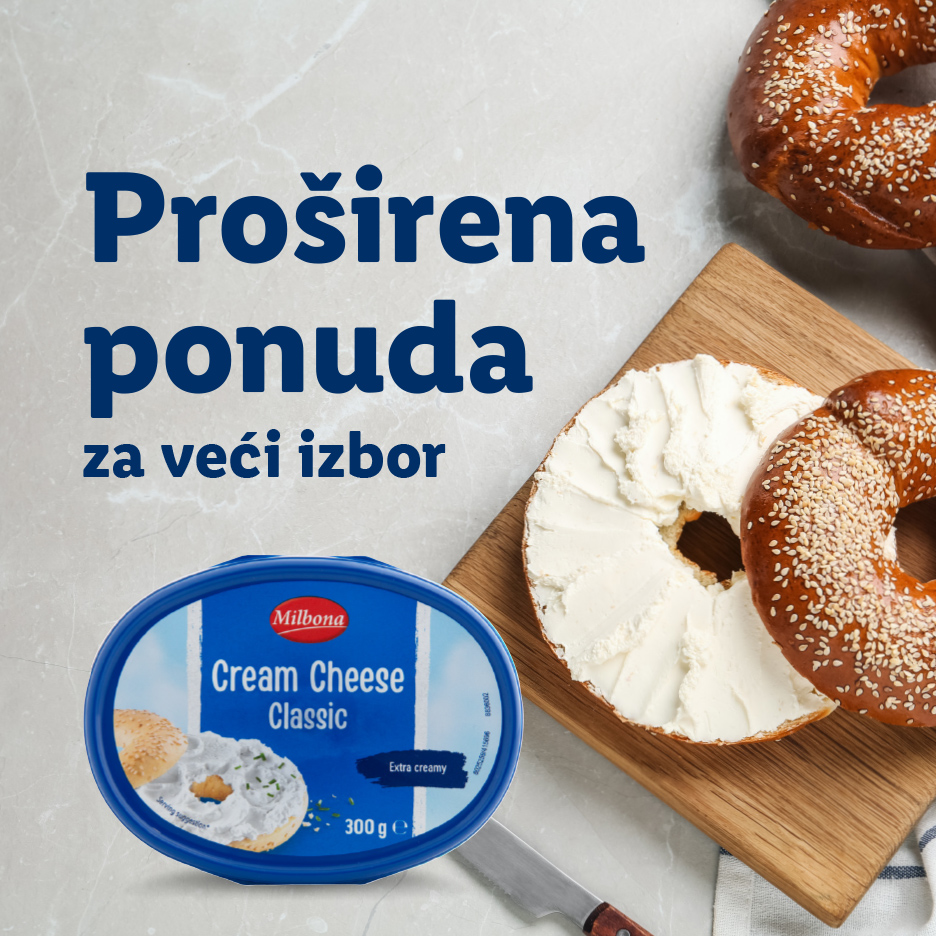 Krem sir u pakovanju sa natpisom 'Proširena ponuda za veći izbor', pored pereca i đevreka.