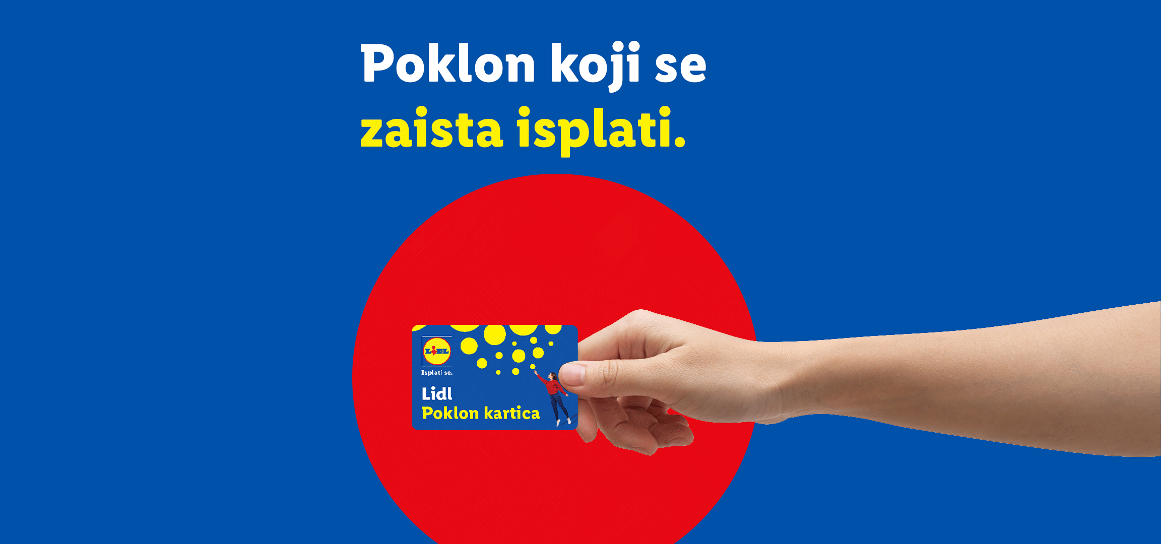 Ruka drži poklon karticu sa žutim krugovima na plavoj pozadini. Tekst: Poklon koji se zaista isplati.