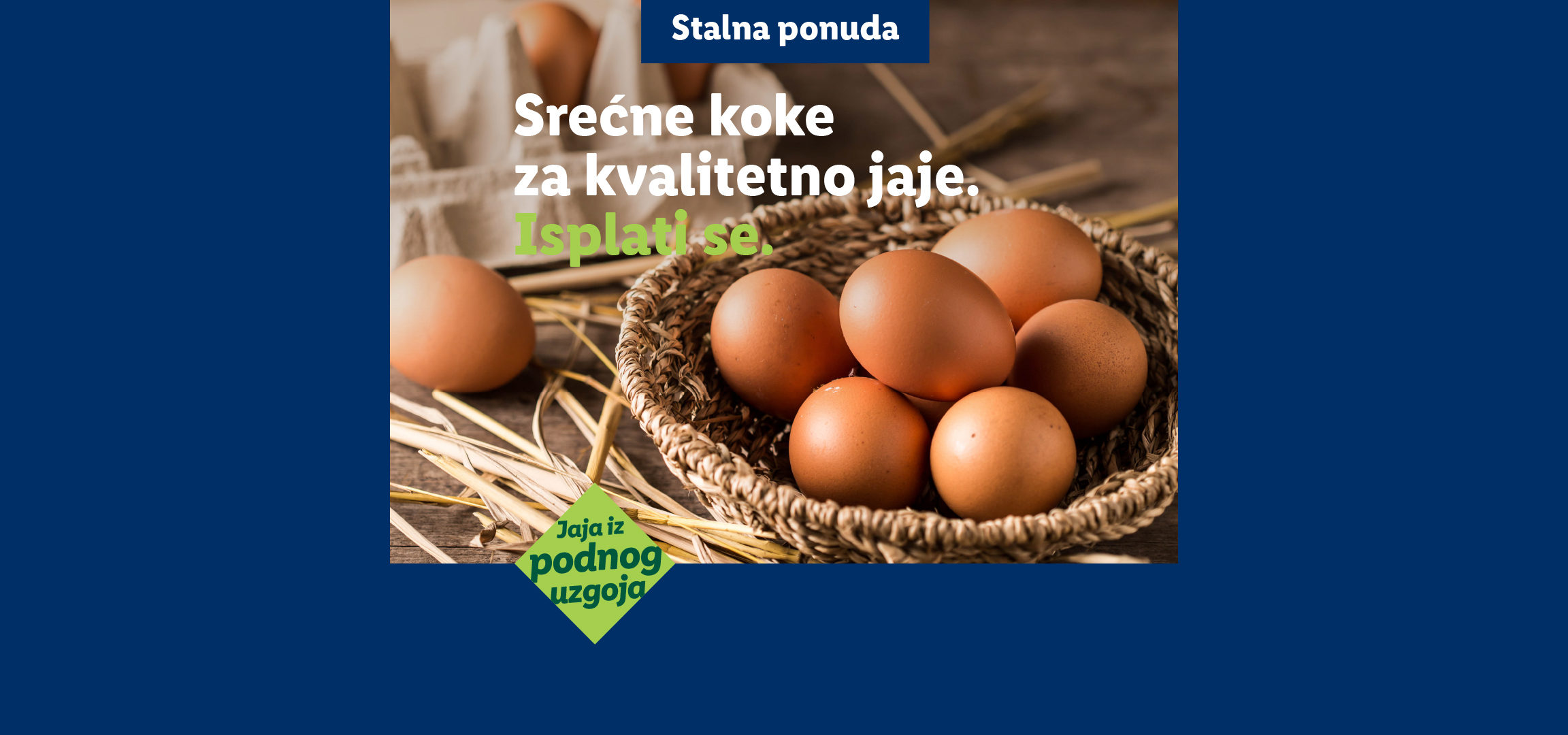 Sveža jaja iz podnog uzgoja u pletenoj korpi, sa natpisom „Srećne koke za kvalitetno jaje. Isplati se.“