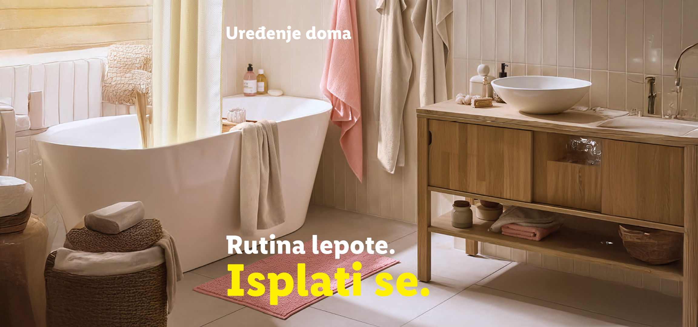 Kupatilo sa kadom, umivaonikom, kozmetičkim koferom i fenom za kosu. Tekst: Uređenje doma, rutina lepote, isplati se.