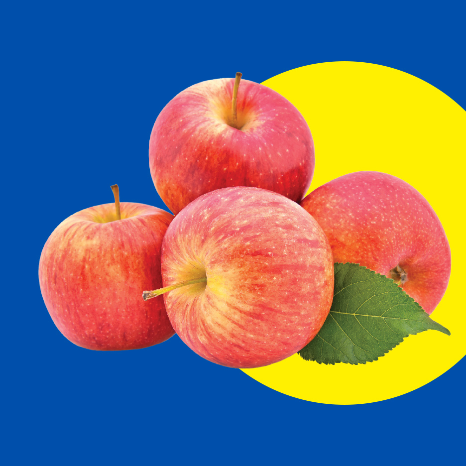 Četiri crvene jabuke sa zelenim listom na plavoj i žutoj pozadini.
