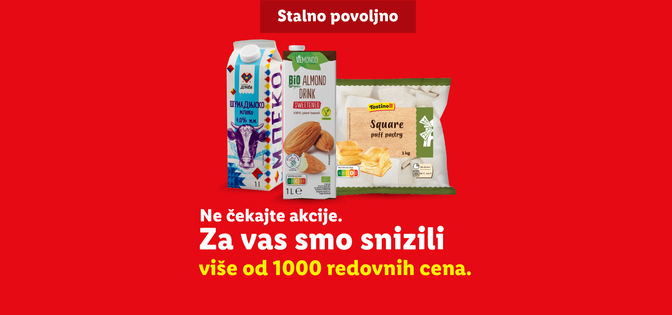 Reklama za Lidl sa mlekom, bademovim napitkom i lisnatim testom, sa natpisom „Stalno povoljno“ i „Ne čekajte akcije. Za vas smo snizili više od 1000 redovnih cena.“