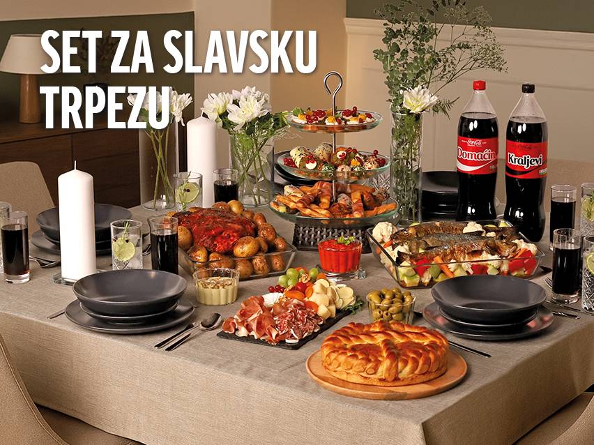 Svečana trpeza sa hranom, pićem i posuđem, uključujući Coca-Colu Domaćin i Kraljevi.